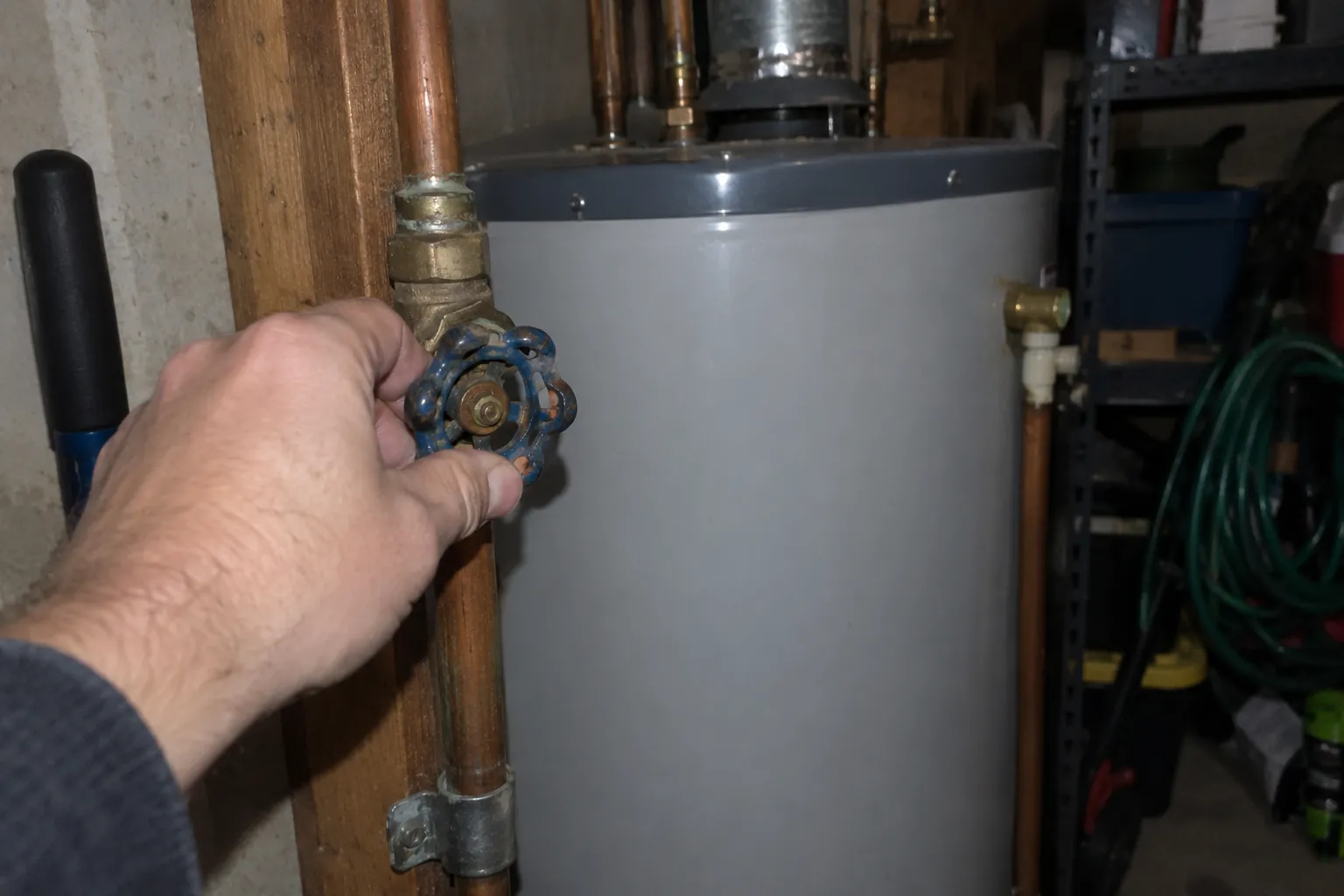 Turning off the main water shut-off valve by a home water heater